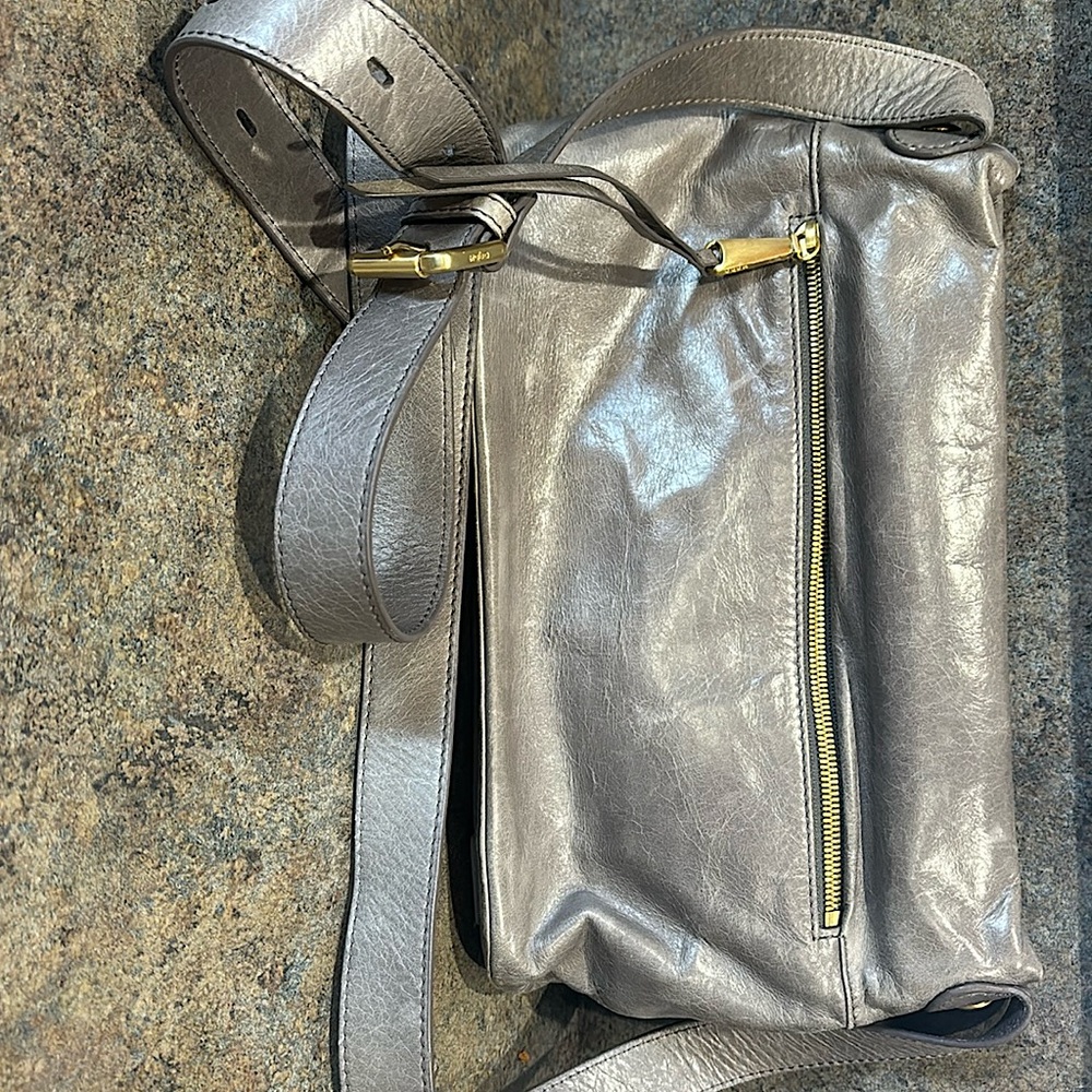 Purse Crossbody Hobo Gray with gold/brass tone hardware and hinged closure